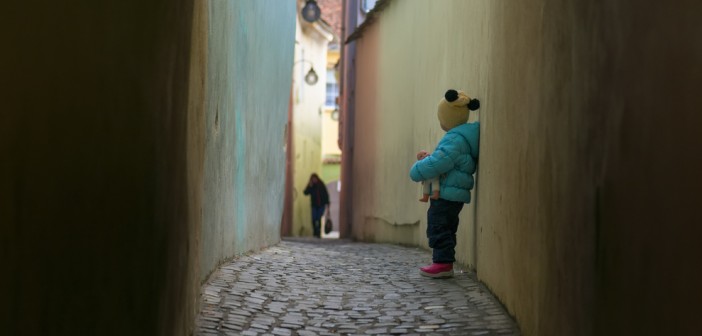 Alone sad child lost on a street